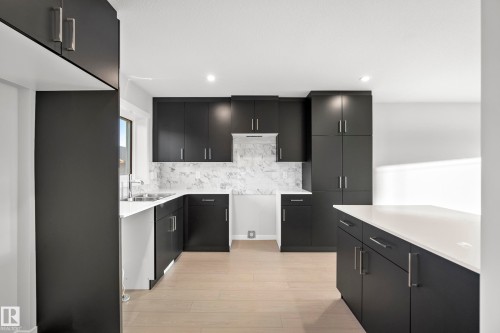 38 Brougham Drive, Ardrossan, AB - Indoor Photo Showing Kitchen With Double Sink With Upgraded Kitchen