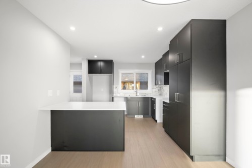 38 Brougham Drive, Ardrossan, AB - Indoor Photo Showing Kitchen With Upgraded Kitchen