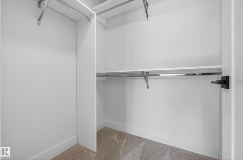 Walk in closet with carpet - 22 Grayson Green, Stony Plain, AB - Indoor With Storage