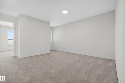 Unfurnished room with light carpet - 22 Grayson Green, Stony Plain, AB - Indoor Photo Showing Other Room