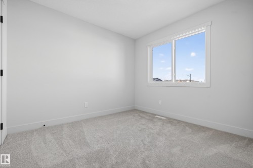 Empty room featuring carpet - 22 Grayson Green, Stony Plain, AB - Indoor Photo Showing Other Room