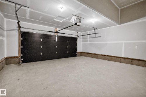 View of garage - 22 Grayson Green, Stony Plain, AB - Indoor Photo Showing Garage