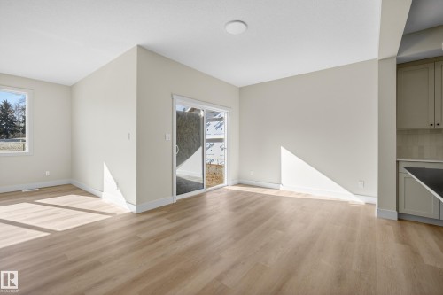 Unfurnished living room with light wood-style flooring and baseboards - 22 Grayson Green, Stony Plain, AB - Indoor