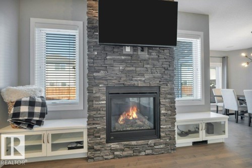 2228 Calhoun Link, Edmonton, AB - Indoor Photo Showing Living Room With Fireplace