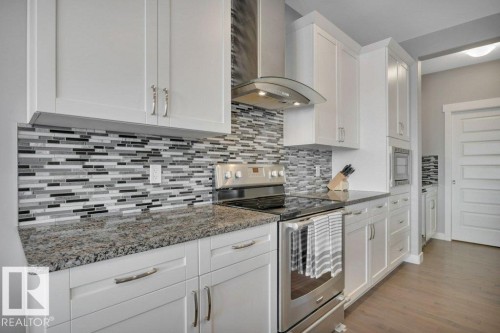 2228 Calhoun Link, Edmonton, AB - Indoor Photo Showing Kitchen With Upgraded Kitchen