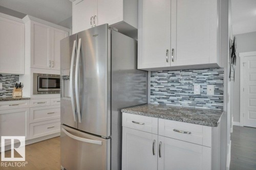 2228 Calhoun Link, Edmonton, AB - Indoor Photo Showing Kitchen With Upgraded Kitchen