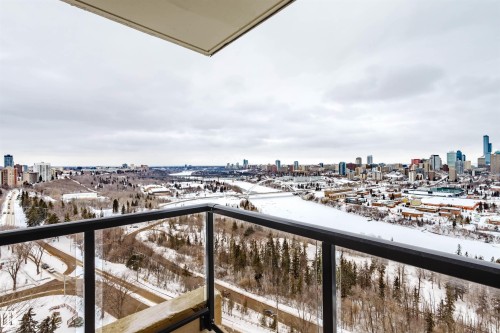 Snow covered back of property with a city view - 1803 10149 Saskatchewan Drive, Edmonton, AB - Outdoor With View