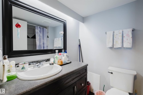 Full bathroom with vanity and curtained shower - 1803 10149 Saskatchewan Drive, Edmonton, AB - Indoor Photo Showing Bathroom