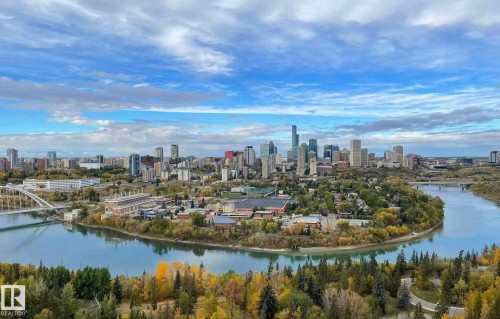 Aerial view of a large body of water, skyline, and a notable bridge - 1803 10149 Saskatchewan Drive, Edmonton, AB - Outdoor With Body Of Water With View