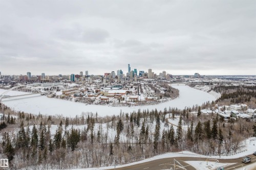 Snowy aerial view featuring a skyline view - 1803 10149 Saskatchewan Drive, Edmonton, AB - Outdoor With View