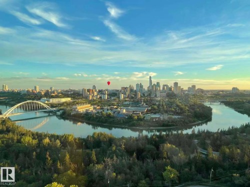 View of city skyline featuring a nearby body of water and a notable bridge - 1803 10149 Saskatchewan Drive, Edmonton, AB - Outdoor With View