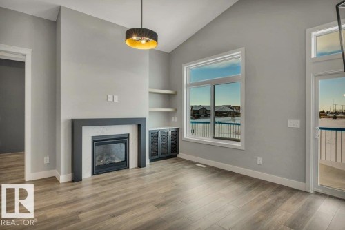 44 Eldridge Point(E), St. Albert, AB - Indoor Photo Showing Living Room With Fireplace