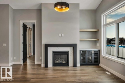 44 Eldridge Point(E), St. Albert, AB - Indoor Photo Showing Living Room With Fireplace