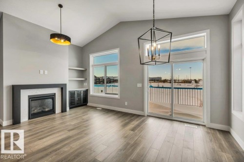 44 Eldridge Point(E), St. Albert, AB - Indoor Photo Showing Other Room With Fireplace