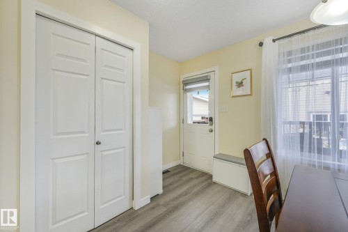 Home office with light wood-style flooring and a textured ceiling - 2348 28B Avenue, Edmonton, AB - Indoor
