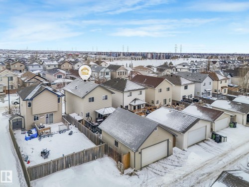 Snowy aerial view featuring a residential view - 2348 28B Avenue, Edmonton, AB - Outdoor