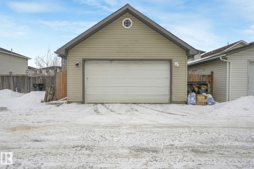 Snow covered garage featuring a garage - 2348 28B Avenue, Edmonton, AB - Outdoor With Exterior