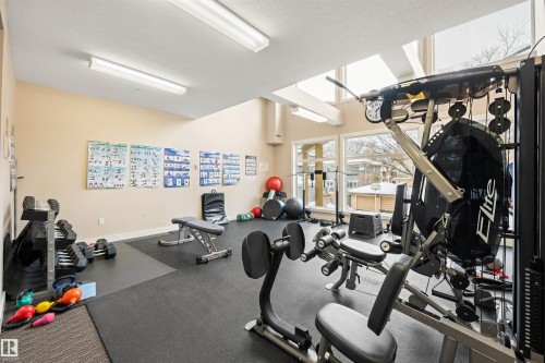 Gym with a textured ceiling - 29 11518 76 Avenue, Edmonton, AB - Indoor Photo Showing Gym Room