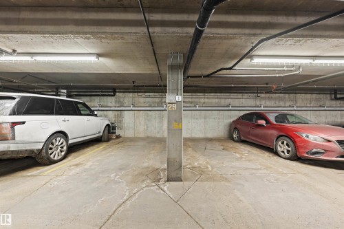 Garage featuring a parking deck - 29 11518 76 Avenue, Edmonton, AB - Indoor Photo Showing Garage