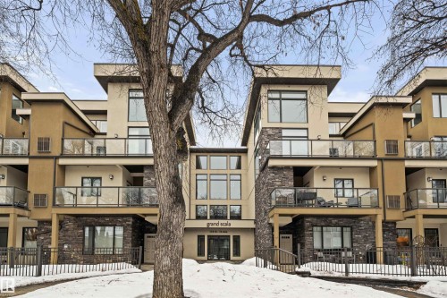 View of snow covered building - 29 11518 76 Avenue, Edmonton, AB - Outdoor With Balcony With Facade