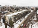 Snowy aerial view with a city view - 29 11518 76 Avenue, Edmonton, AB  - Outdoor With View 