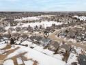 Snowy aerial view with a residential view - 19 Rosemount Boulevard, Beaumont, AB  - Outdoor With View 