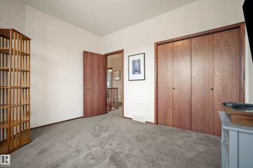 Unfurnished bedroom featuring carpet floors and a closet - 19 Rosemount Boulevard, Beaumont, AB - Indoor Photo Showing Other Room