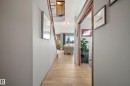 Hall featuring light wood-type flooring - 19 Rosemount Boulevard, Beaumont, AB  - Indoor Photo Showing Other Room 