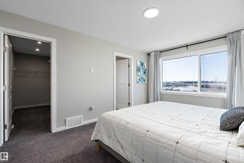 197 Larch Crescent, Leduc, AB - Indoor Photo Showing Bedroom