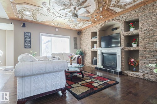 3244 18 Street, Edmonton, AB - Indoor Photo Showing Living Room With Fireplace