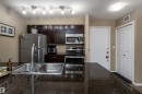 111 5370 Chappelle Road, Edmonton, AB  - Indoor Photo Showing Kitchen With Stainless Steel Kitchen With Double Sink 