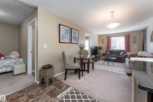 111 5370 Chappelle Road, Edmonton, AB - Indoor Photo Showing Living Room