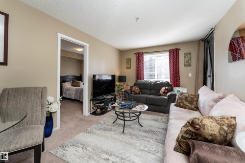 111 5370 Chappelle Road, Edmonton, AB - Indoor Photo Showing Living Room
