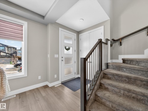 Entrance foyer featuring stairs and light wood-type flooring - 9358 Pear Link Link, Edmonton, AB - Indoor Photo Showing Other Room
