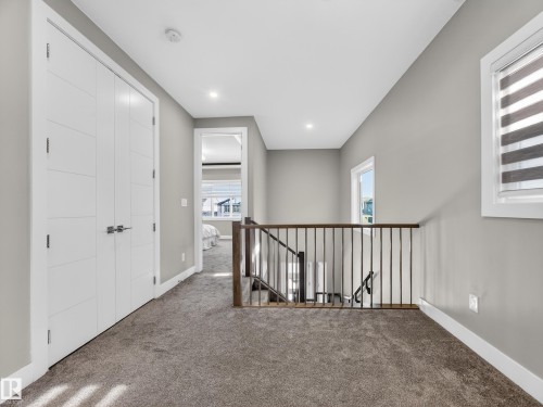 Corridor featuring carpet flooring, an upstairs landing, and recessed lighting - 9358 Pear Link Link, Edmonton, AB - Indoor Photo Showing Other Room