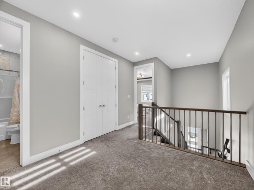 Corridor with an upstairs landing, carpet, and recessed lighting - 9358 Pear Link Link, Edmonton, AB - Indoor Photo Showing Other Room