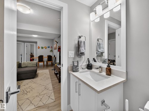Bathroom with vanity and light wood-style floors - 9358 Pear Link Link, Edmonton, AB - Indoor Photo Showing Bathroom