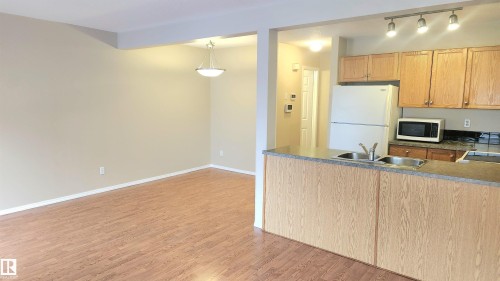 181 230 Edwards Drive, Edmonton, AB - Indoor Photo Showing Kitchen With Double Sink