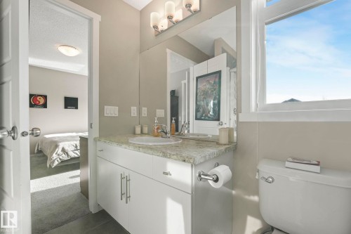 Ensuite bathroom featuring vanity and dark carpet - 97 James Cres, St. Albert, AB - Indoor Photo Showing Bathroom