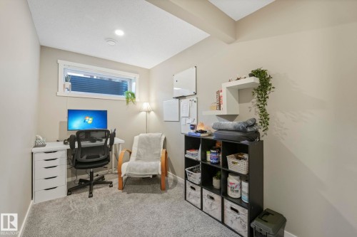 Office area with light colored carpet and baseboards - 97 James Cres, St. Albert, AB - Indoor Photo Showing Office