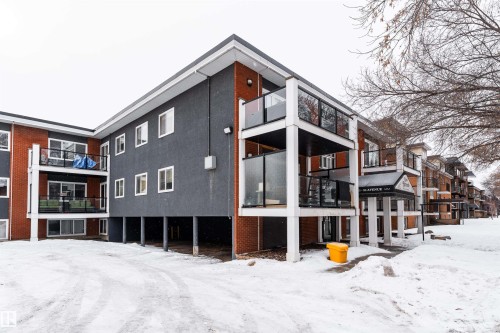 View of snow covered building - 7 10525 83 Avenue, Edmonton, AB - Outdoor With Facade