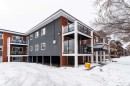 View of snow covered building - 7 10525 83 Avenue, Edmonton, AB  - Outdoor With Facade 