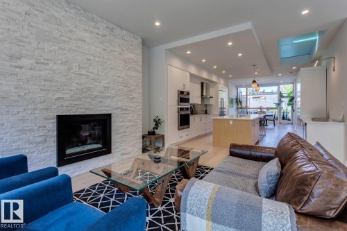 12420 103 Avenue, Edmonton, AB - Indoor Photo Showing Living Room With Fireplace