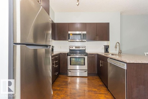1404 10152 104 Street, Edmonton, AB - Indoor Photo Showing Kitchen With Stainless Steel Kitchen With Upgraded Kitchen