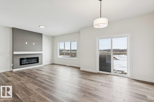 41 Gable Common, Spruce Grove, AB - Indoor Photo Showing Living Room With Fireplace
