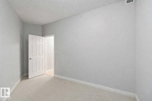 402 9020 Jasper Avenue, Edmonton, AB - Indoor Photo Showing Other Room