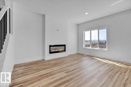 70 Sumac Close, Fort Saskatchewan, AB - Indoor Photo Showing Living Room With Fireplace