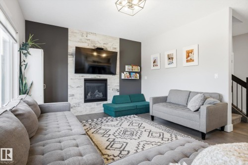 1815 Tanager Close, Edmonton, AB - Indoor Photo Showing Living Room With Fireplace