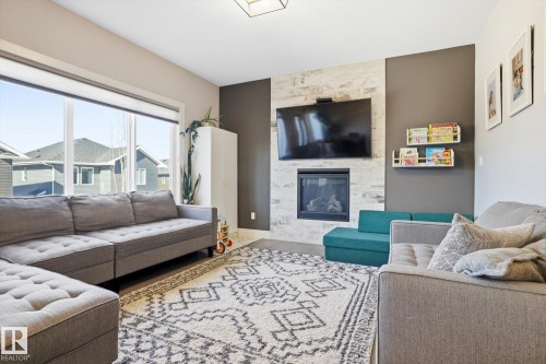 1815 Tanager Close, Edmonton, AB - Indoor Photo Showing Living Room With Fireplace