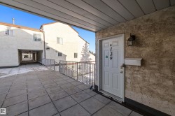 View of exterior entry featuring stucco siding - 